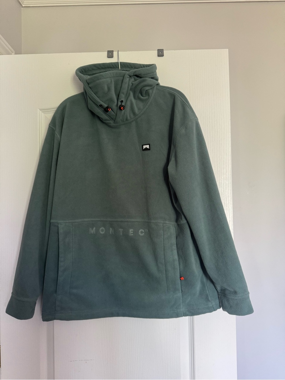 Montec women’s Sage Green Fleece Pullover Hoodie.